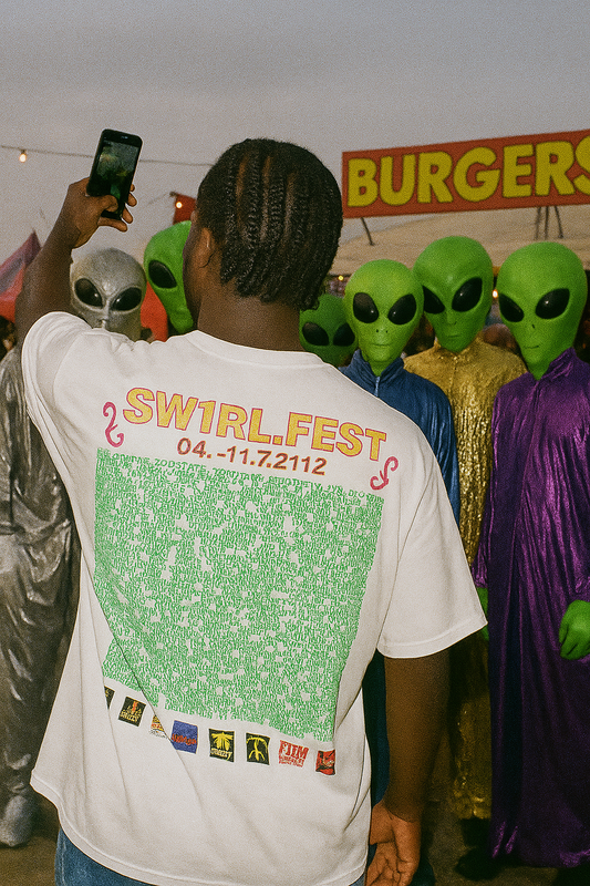 White oversized t-shirt with Sw1rlFest festival lineup print on the back – Tamaro Tigro Sw1rlFest Tee