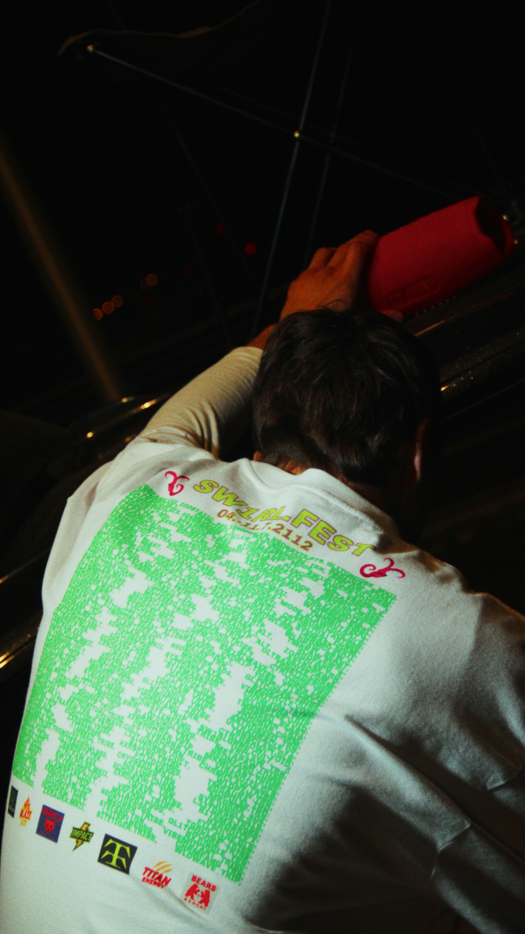 White oversized t-shirt with Sw1rlFest festival lineup print on the back – Tamaro Tigro Sw1rlFest Tee