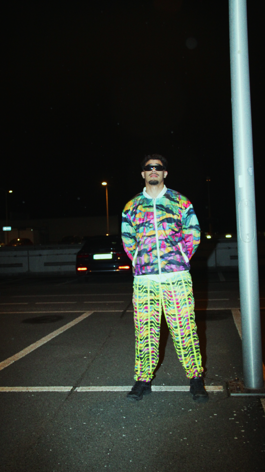 Black trackpants with mesh lining, cuffed ankles, and zip pockets – Tamaro Tigro TigroCore Trackpants and Graphic print tracksuit jacket with fleece lining and front zipper – Tamaro Tigro TigroCore Jacket